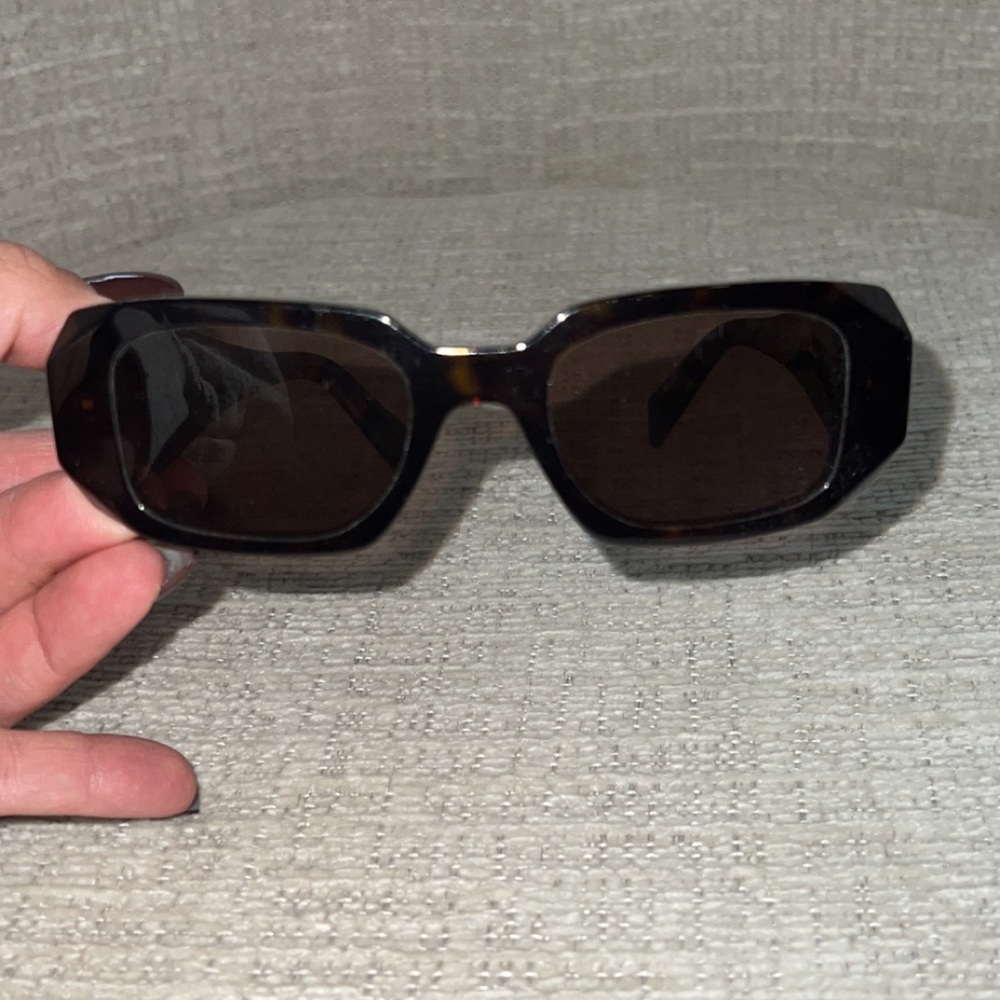 Prada rectangle to tortoise sunglasses. Used but barely worn. Perfect condition.